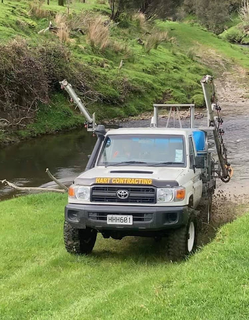 Hart Contracting spray ute beside a stream